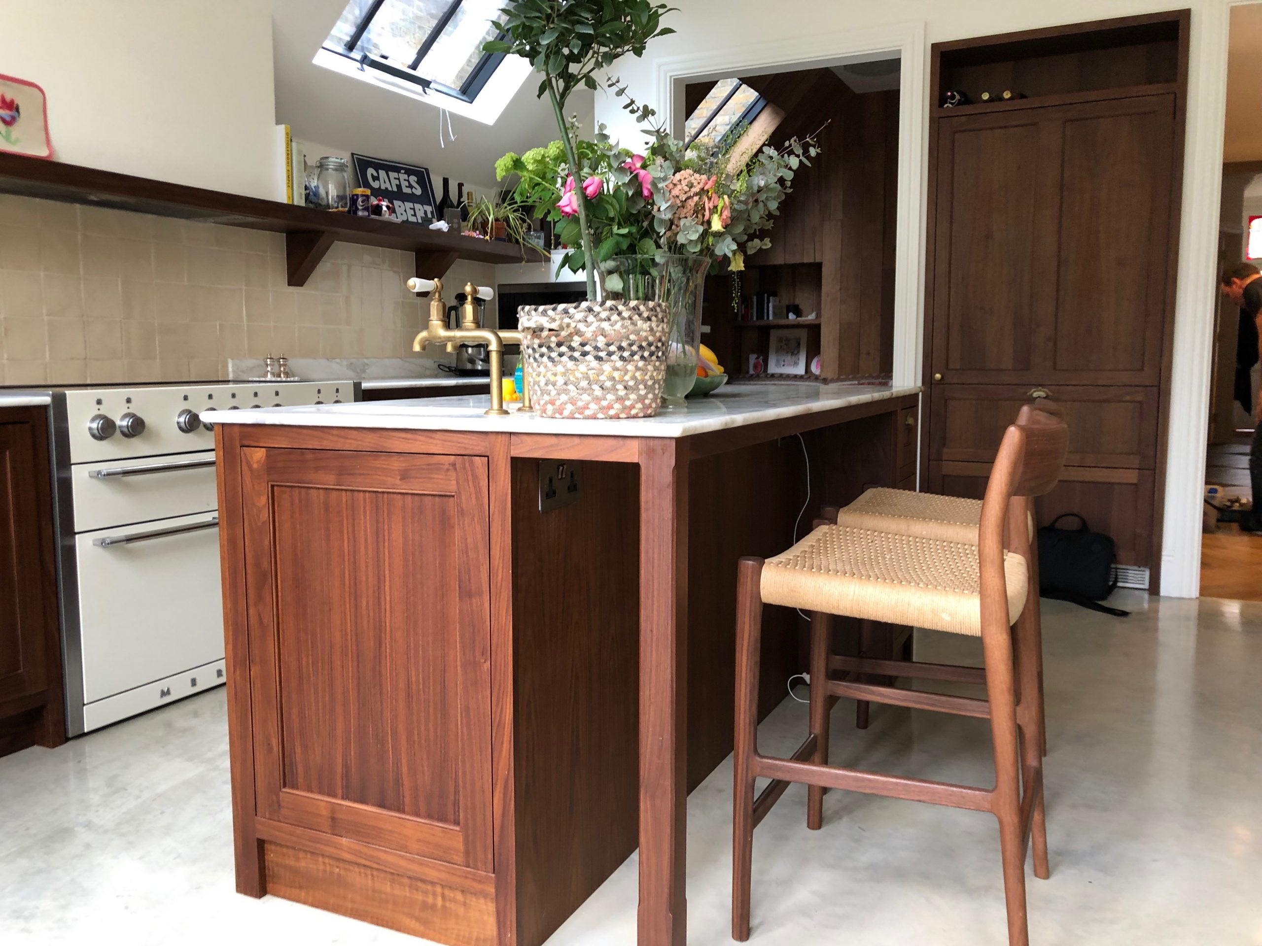 Traditional walnut shaker kitchen in Finchley, including bespoke storage solutions