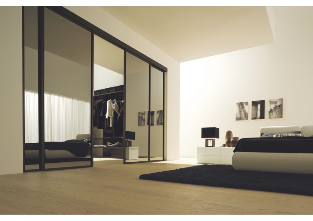 Bedroom furniture solutions: Mirror door walk in wardrobe